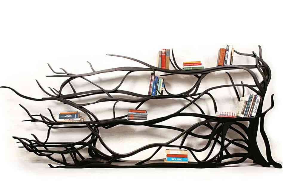Metamorphosis: The shelves of Sebastian Errazuriz's one-off, hand-carved bookcase were inspired by the branches that grew on his childhood home in Santiago, Chile.
