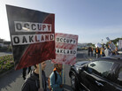 Two members of Occupy Oakland join striking Golden Gate Bridge, bus and ferry workers at the Larkspur Ferry Terminal in Larkspur, Calif on Tuesday. Two members of Occupy Oakland join striking Golden Gate Bridge, bus and ferry workers at the Larkspur Ferry Terminal in Larkspur, Calif on Tuesday.