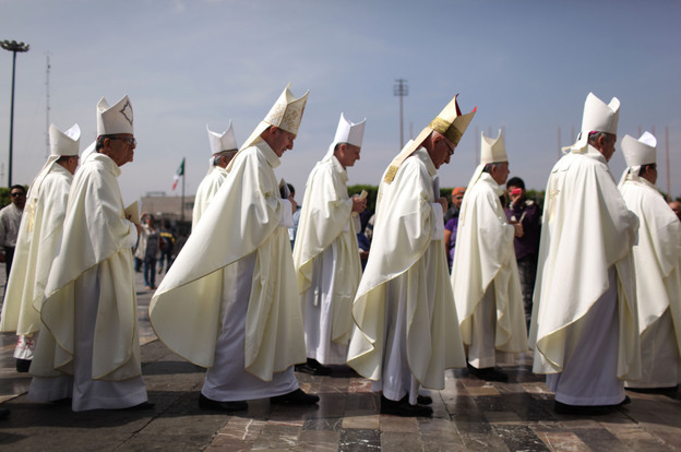 Priests stand prior to the beatification ceremony for the late sister Maria Ines Teresa Arias outside the Basilica of Our Lady of Guadalupe in Mexico City in April.