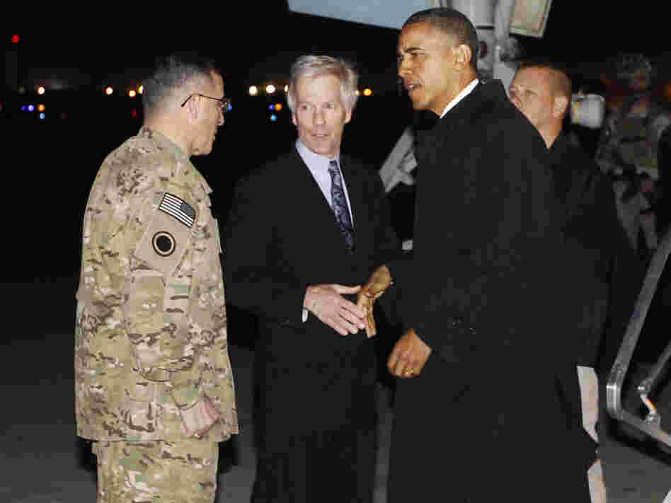 President Barack Obama is greeted by Lt. Gen. Curtis "Mike" Scaparrotti, and U.S. Ambassador to Afghanistan Ryan Crocker as he steps off Air Force One at Bagram Air Field in Afghanistan earlier today (Tuesday, May 1).
