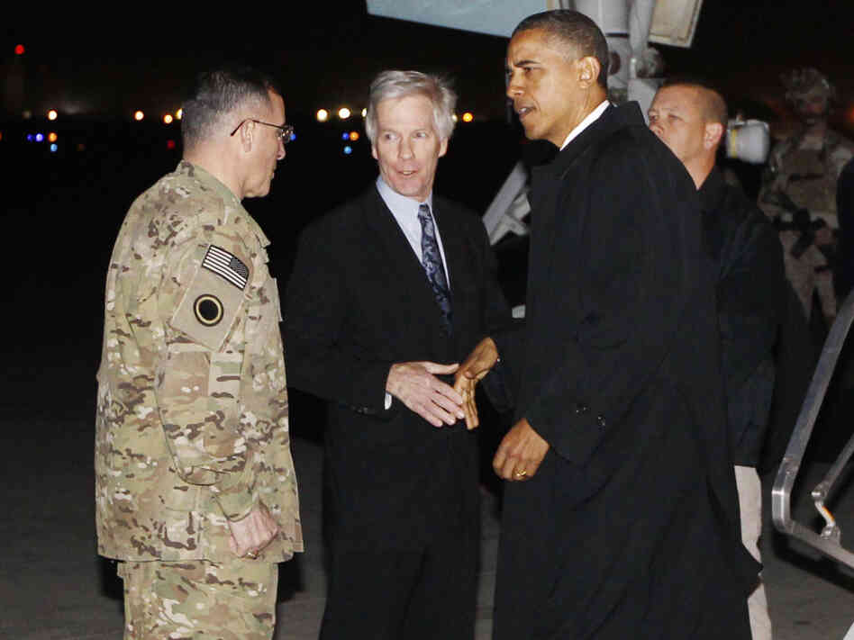 President Barack Obama is greeted by Lt. Gen. Curtis "Mike" Scaparrotti, and U.S. Ambassador to Afghanistan Ryan Crocker as he steps off Air Force One at Bagram Air Field in Afghanistan earlier today (Tuesday, May 1).