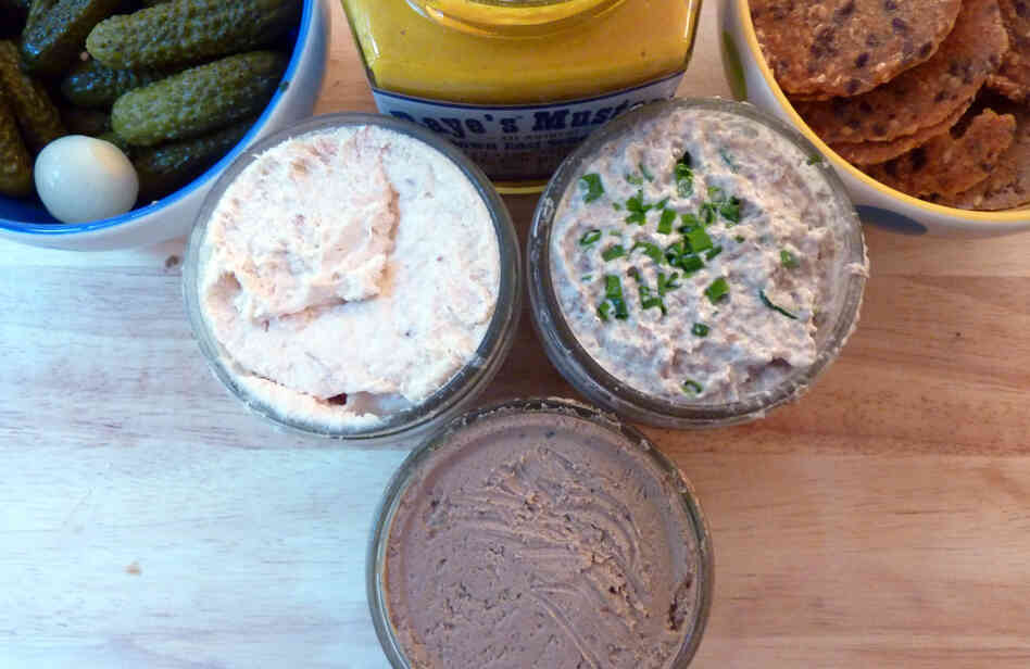 Smoked Trout Pate (left), Tuscan Chicken Liver Pate and Mushroom Pate (right) are served with cornichons, mustard and crackers.