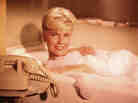 Pillow Talk stars Doris Day (above) and Rock Hudson as a pair of strangers who butt heads and fall in love on a shared telephone line.