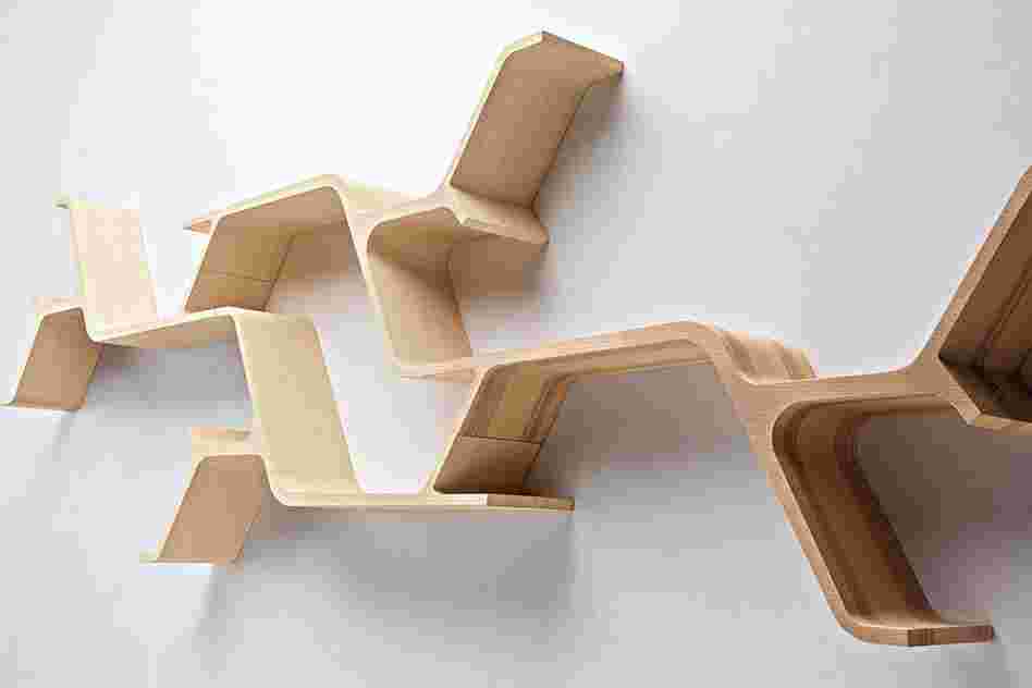Sinapsi: Sebastian Errazuriz's design is inspired by neurons receiving electrical and chemical impulses, a process he likens to bookshelves receiving books and absorbing them into their environment.