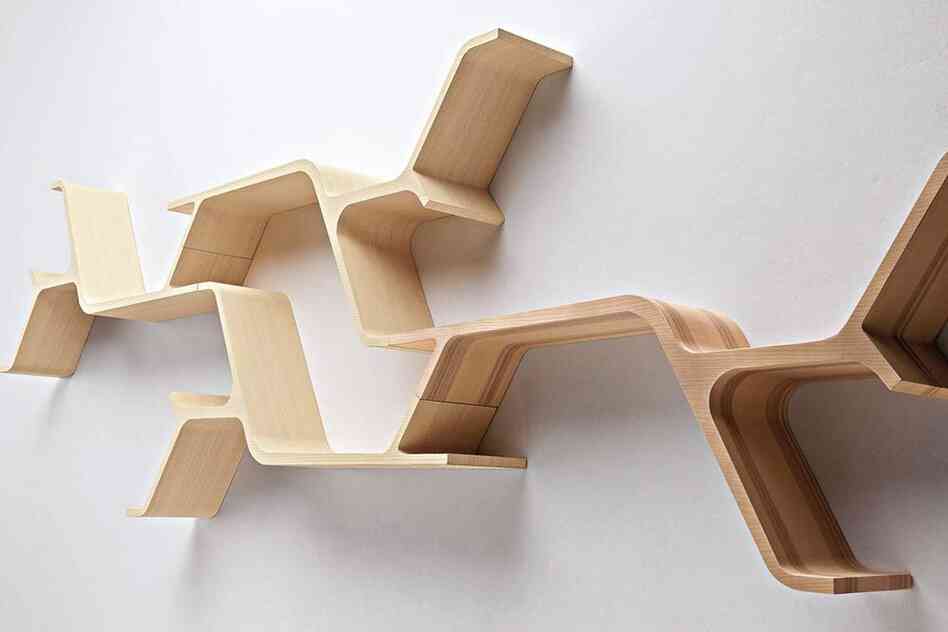 Sinapsi: Sebastian Errazuriz's design is inspired by neurons receiving electrical and chemical impulses, a process he likens to bookshelves receiving books and absorbing them into their environment.