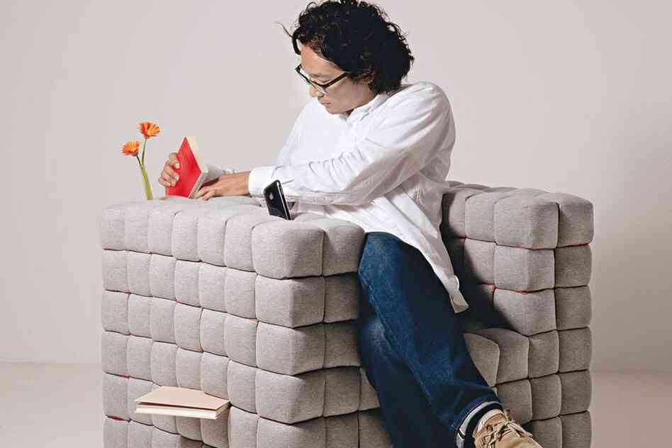 Lost In Sofa: Books can be "shelved between the cushions" of Tokyo designer Daisuke Motogi's "Lost in Sofa."