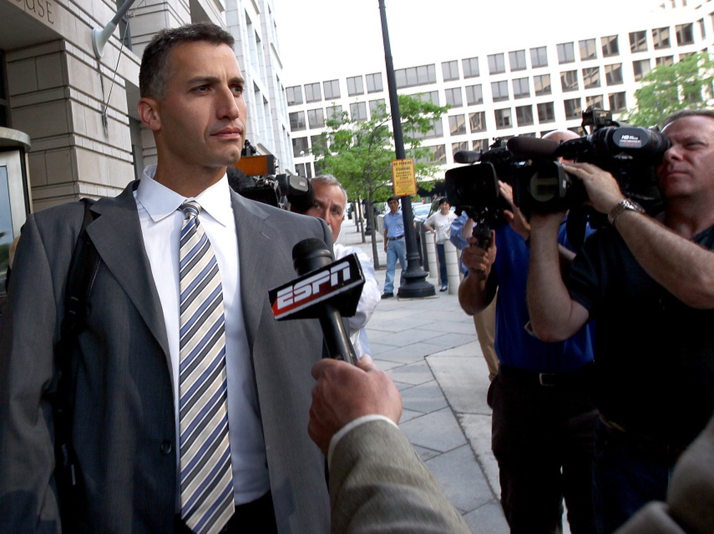 Andy Pettitte leaves the courthouse after testifying Wednesday in the perjury and obstruction trial of former teammate Roger Clemens in Washington, D.C.