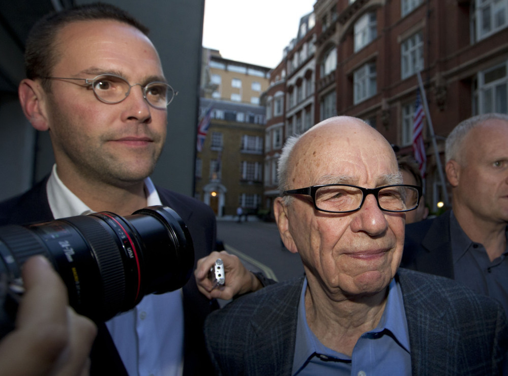 Rupert Murdoch, shown above with his son James (left) last July.
