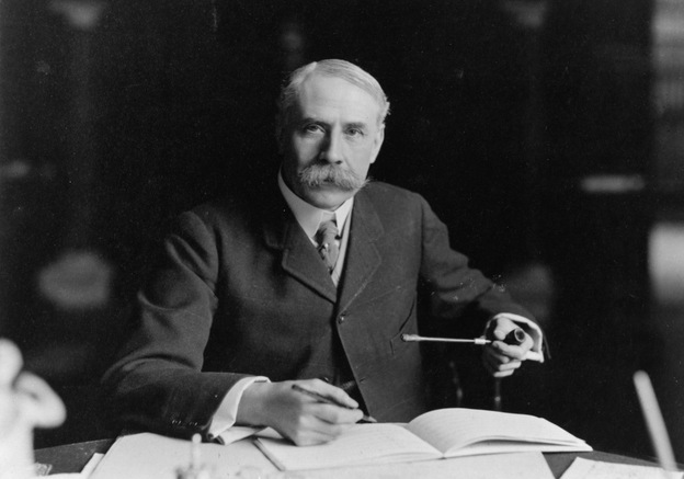 British composer Edward Elgar, seated at his desk at Severn House in Hampstead. His Symphony No. 1 was hailed as the best British symphony ever when it debuted in 1908.