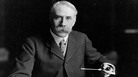 British composer Edward Elgar, seated at his desk at Severn House in Hampstead. His Symphony No. 1 was hailed as the best British symphony ever when it debuted in 1908. British composer Edward Elgar, seated at his desk at Severn House in Hampstead. His Symphony No. 1 was hailed as the best British symphony ever when it debuted in 1908.