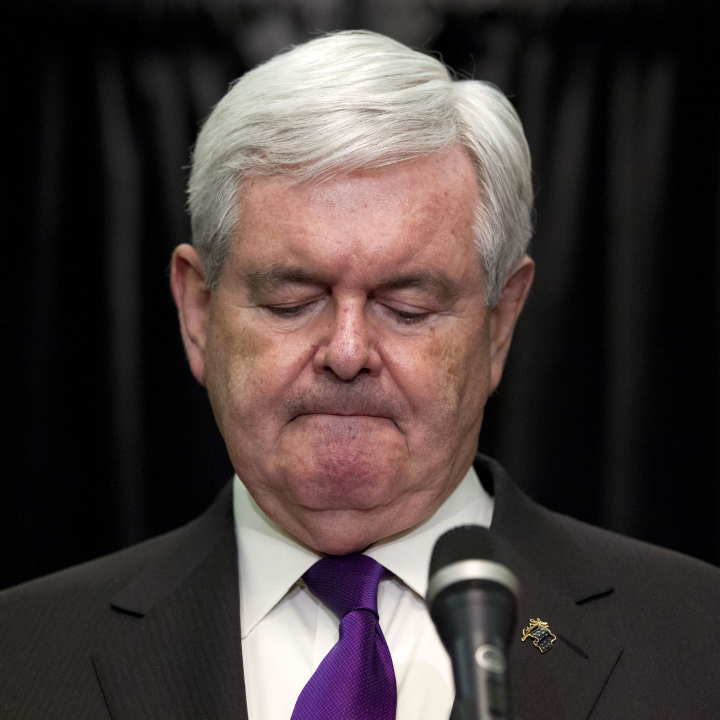 Former House Speaker Newt Gingrich pauses while announcing that he is suspending his presidential campaign Wednesday in Arlington, Va.