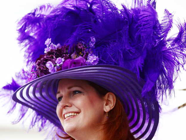 Bridget Voss of Chicago, Illinois wears a Derby hat near the paddock at Churchill Downs on the afternoon of the 2011 Kentucky Derby.