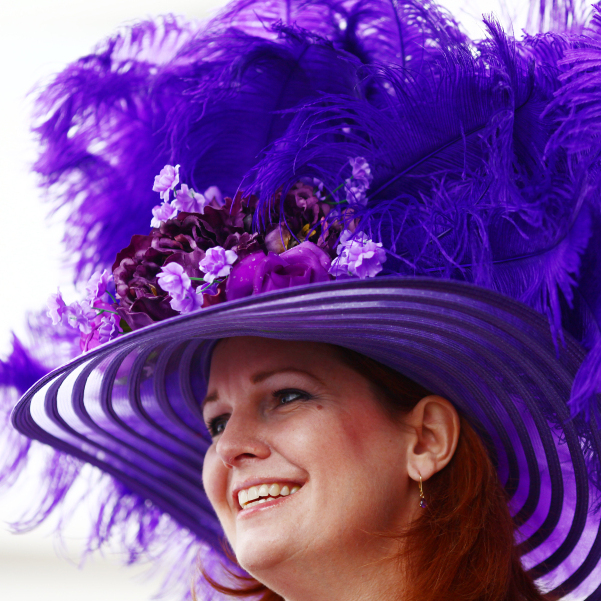 Bridget Voss of Chicago, Illinois wears a Derby hat near the paddock at Churchill Downs on the afternoon of the 2011 Kentucky Derby.