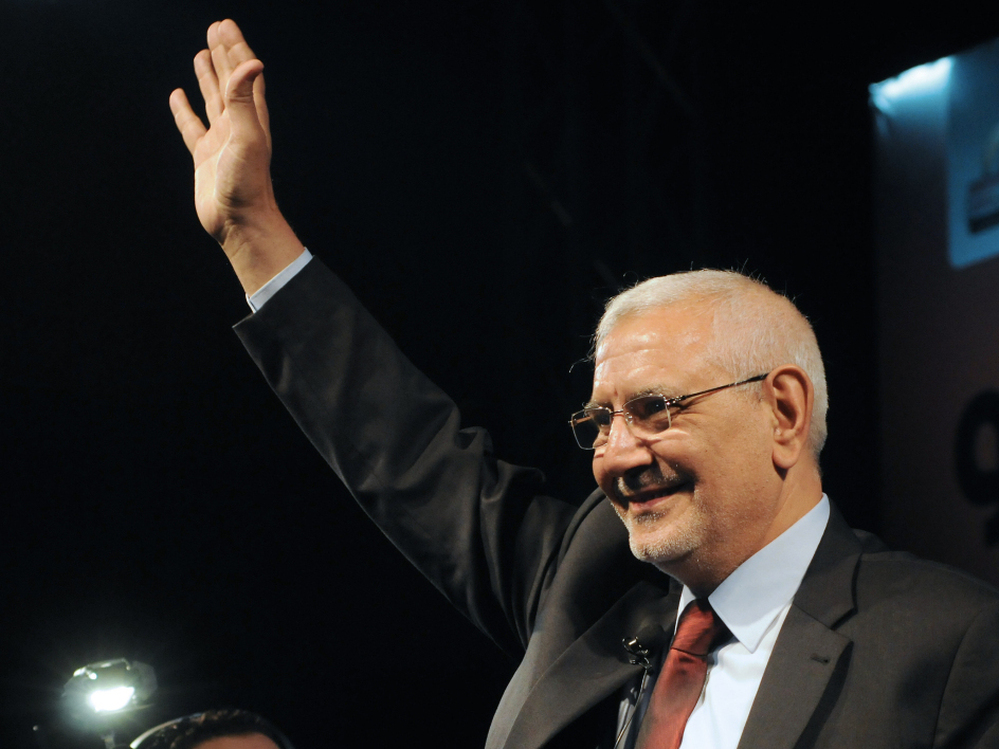 Egyptian former Muslim Brotherhood senior member and now independent presidential candidate Abdel Moneim Abol Fotouh gestures to the crowd on stage during his election campaign rally on April 2, 2012, at the Azhar park in Cairo.