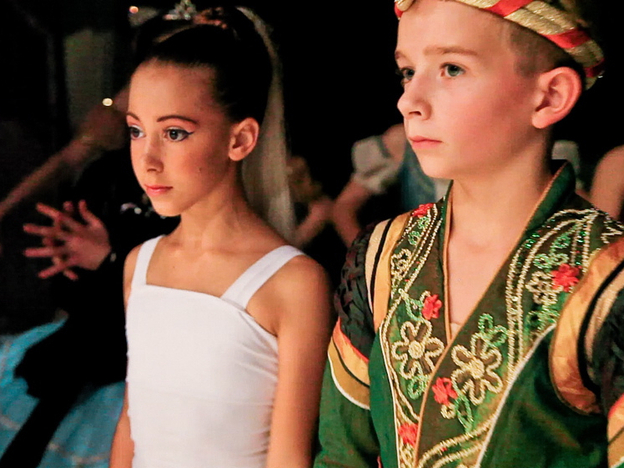 Gaya Bommer and Aran Bell in First Position. Aran, who is 11 in the film, began dance training at age 4.