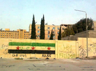 A handout picture released by the Syrian opposition's Shaam News Network shows anti-regime graffiti sprayed on the walls of Aleppo University. A handout picture released by the Syrian opposition's Shaam News Network shows anti-regime graffiti sprayed on the walls of Aleppo University.