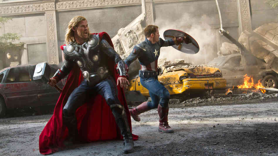 Thor (Chris Hemsworth, left) and Captain America (Chris Evans) join up with Iron Man and the Hulk to save the Earth in The Avengers. Thor (Chris Hemsworth, left) and Captain America (Chris Evans) join up with Iron Man and the Hulk to save the Earth in The Avengers.