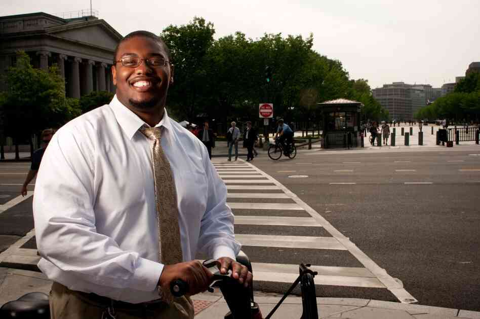 Alex Tremble works in leadership development and has commuted by bike for the past month. He says his reluctance to buy a helmet is psychological: "If you don't own [a helmet], maybe you don't really feel like a 'bike rider.' " Now that he uses a bike every day, he says, "I need to get one."