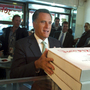 The same day President Obama made a surprise trip to Afghanistan, Mitt Romney picked up pizza for firefighters with former New York City Mayor Rudolph Giuliani. The same day President Obama made a surprise trip to Afghanistan, Mitt Romney picked up pizza for firefighters with former New York City Mayor Rudolph Giuliani.