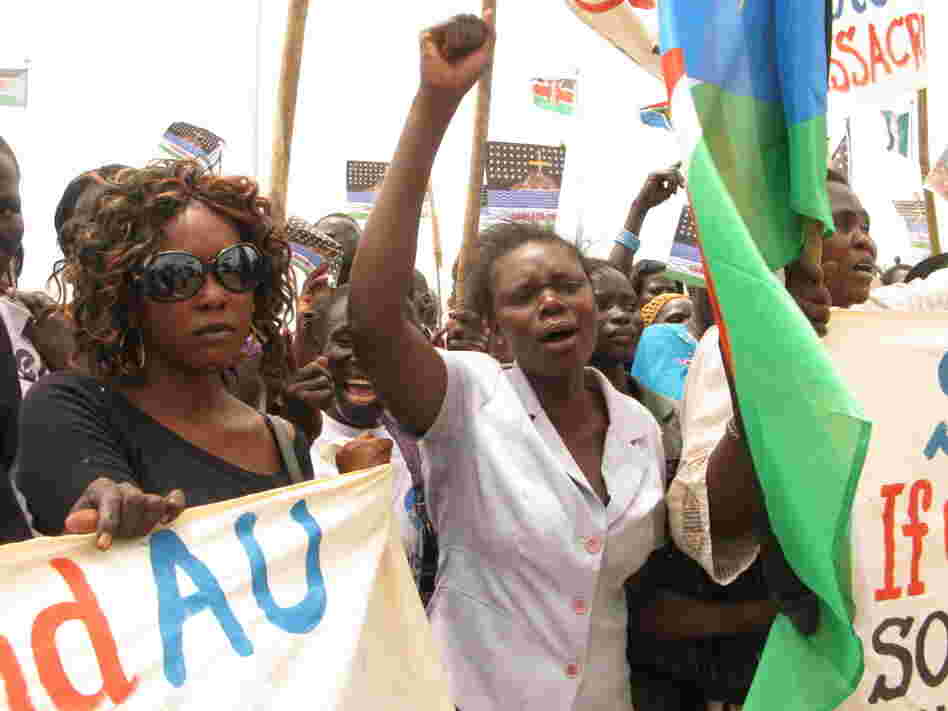 Student Gloria Emmanuel (center) speaks for many South Sudanese who claim Sudan, and its president, Omar Hassan Al Bashir, have declared war on the South.