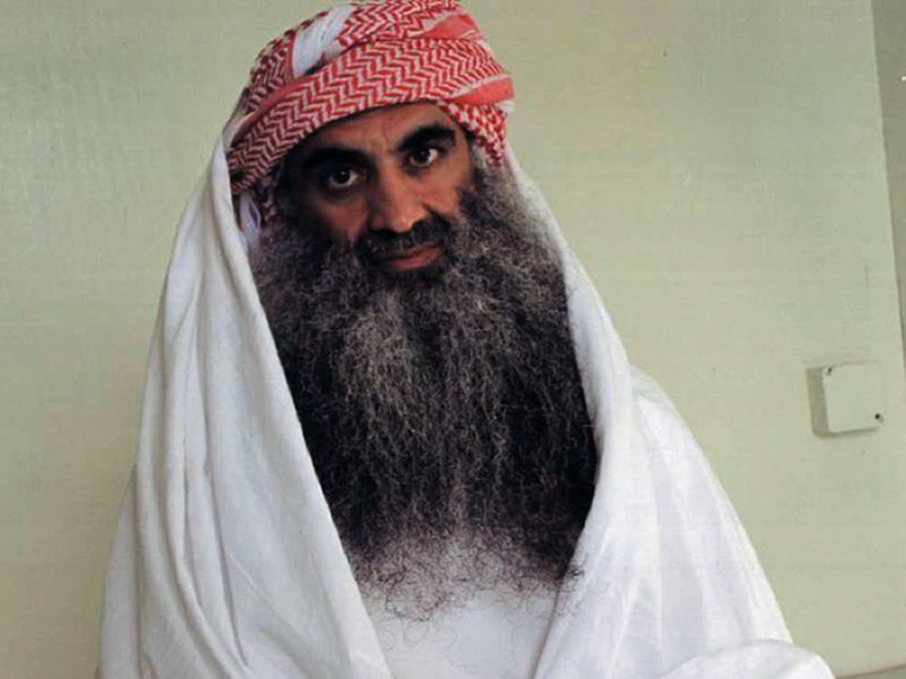 A picture posted on the website www.muslm.net in 2009 allegedly shows al-Qaida's Khalid Sheikh Mohammed, who has claimed to be the mastermind of the Sept. 11 attacks, at the Guantanamo Bay detention camp.
