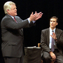 Sen. Ted Kennedy, D-Mass., and Republican challenger Mitt Romney (right) take part in a televised debate at Holyoke Community College in Holyoke, Mass., in 1994. Romney lost to Kennedy in his first political race.