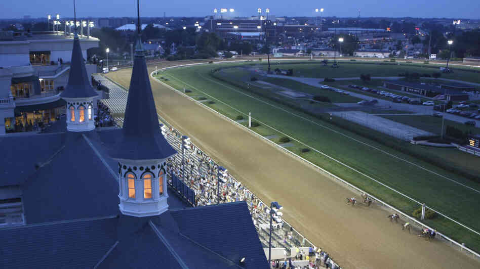The field of horses charges down the stretch in the seventh race at Churchill Downs in Louisville, Ky., on June 19, 2009. The day marked the first night racing at the storied track in its 135-year history. Track superintendent Butch Lehr is retiring after Saturday's race. He's been maintaining the track since 1982. The field of horses charges down the stretch in the seventh race at Churchill Downs in Louisville, Ky., on June 19, 2009. The day marked the first night racing at the storied track in its 135-year history. Track superintendent Butch Lehr is retiring after Saturday's race. He's been maintaining the track since 1982.