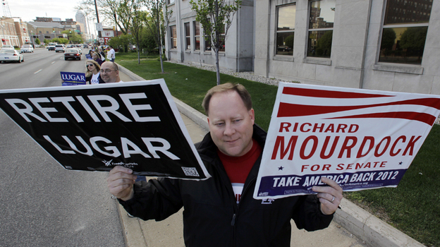 Brent Gentry shows his support for Richard Mourdock before a U.S. Senate debate on April 11 in Indianapolis.