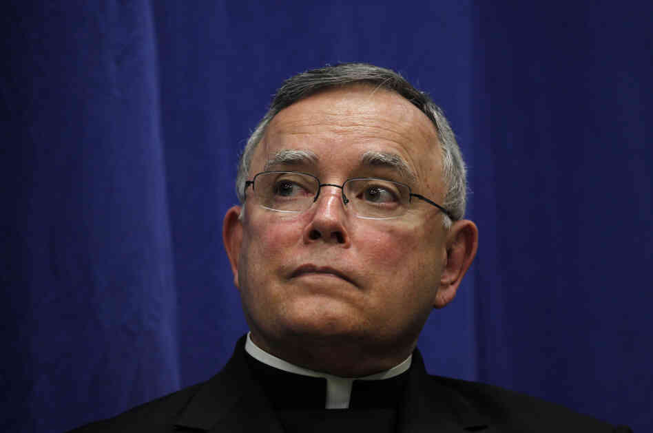 Archbishop of Philadelphia Charles Chaput listens during a news conference on Friday in Philadelphia.