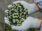 A technician at an Eli Lilly & Co. factory holds capsules of Cymbalta, an antidepressant. A brazen theft at a company warehouse in Connecticut two years ago appears to have been solved. A technician at an Eli Lilly & Co. factory holds capsules of Cymbalta, an antidepressant. A brazen theft at a company warehouse in Connecticut two years ago appears to have been solved.
