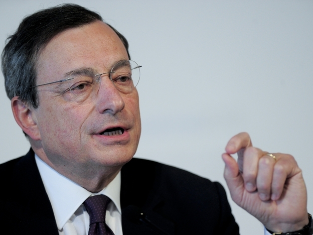 European Central Bank President Mario Draghi speaks at a news conference in Barcelona on Thursday. Central bank chiefs gathered under tight security in Spain to discuss whether to provide more easy money for governments as the political resolve to rein in deficits showed signs of crumbling.