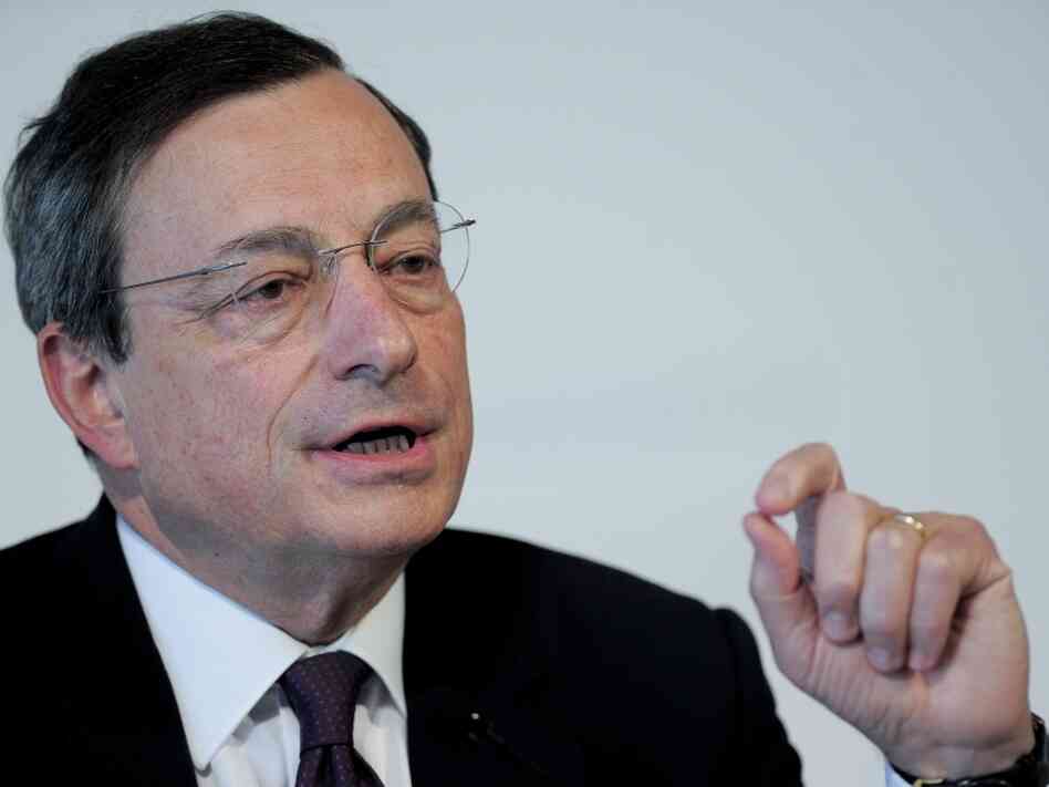 European Central Bank President Mario Draghi speaks at a news conference in Barcelona on Thursday. Central bank chiefs gathered under tight security in Spain to discuss whether to provide more easy money for governments as the political resolve to rein in deficits showed signs of crumbling.
