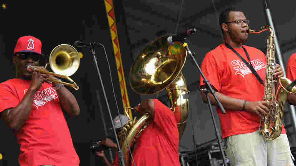 The Stooges Brass Band performs during the 2012 New Orleans Jazz & Heritage Festival.