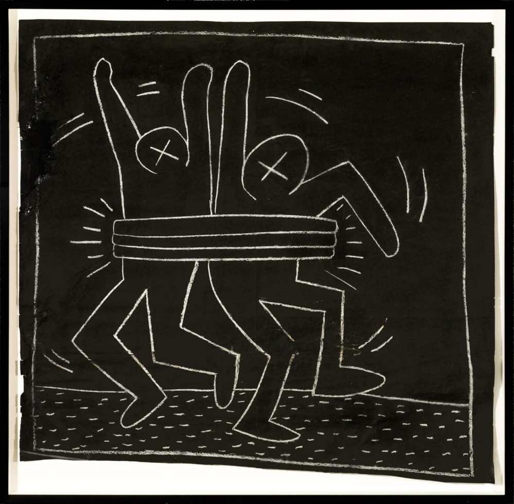 Untitled, circa 1980-1985, chalk on black paper. These subway drawings were visible only until the Transit Authority covered them with new advertisements — but many enterprising collectors managed to pry them free and save them.