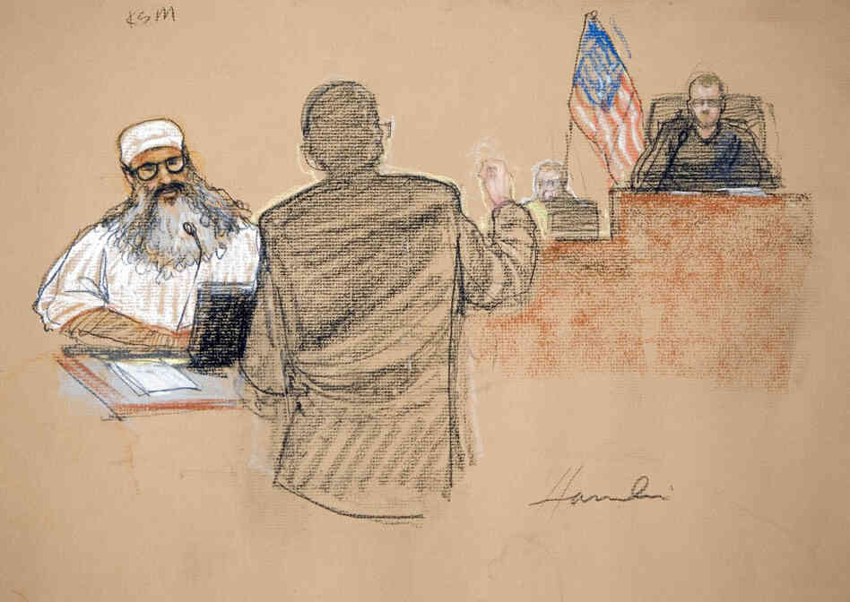 In this photograph of a courtroom sketch, Khalid Sheikh Mohammed, charged with orchestrating the Sept. 11 attacks, attends a court hearing at Guantanamo in 2008. He's expected to appear in a military court Saturday.