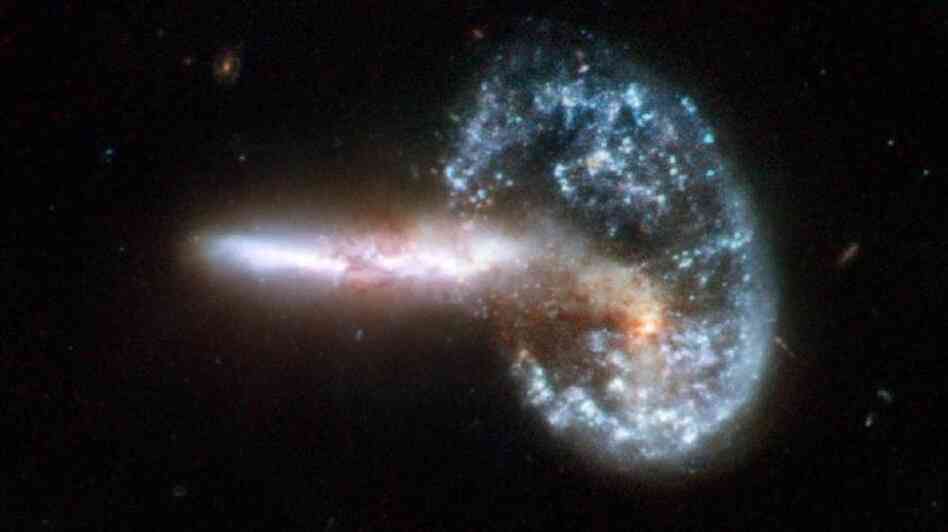 Arp 148 which shows two galaxies in collision, is located in the constellation of Ursa Major, the Great Bear, approximately 500 million light-years away.
