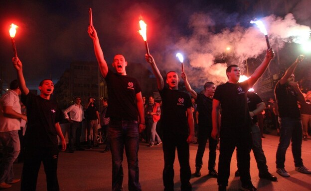 Members of the Greek neo-Nazi Golden Dawn Party celebrate in Thessaloniki on Sunday. Golden Dawn is now set to enter parliament for the first time since the end of the military junta in 1974. Members of the Greek neo-Nazi Golden Dawn Party celebrate in Thessaloniki on Sunday. Golden Dawn is now set to enter parliament for the first time since the end of the military junta in 1974.