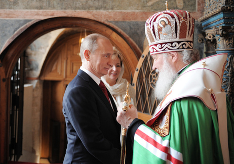 Russia's President Vladimir Putin and his wife Lyudmila speak with Russian Orthodox Church head, Patriarch Kirill, during a service at Blagoveshchensky (the Annunciation) cathedral after Putin's inauguration ceremony. Putin took his oath of office today to become Russia's president for a historic third mandate at a glittering ceremony inside the Kremlin. Russia's President Vladimir Putin and his wife Lyudmila speak with Russian Orthodox Church head, Patriarch Kirill, during a service at Blagoveshchensky (the Annunciation) cathedral after Putin's inauguration ceremony. Putin took his oath of office today to become Russia's president for a historic third mandate at a glittering ceremony inside the Kremlin.