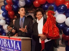 Barack Obama, then a Democratic candidate for a U.S. House seat, delivers his concession speech to supporters, while his wife, Michelle, tends to their daughter, Malia, on March 21, 2000, in Chicago. Barack Obama, then a Democratic candidate for a U.S. House seat, delivers his concession speech to supporters, while his wife, Michelle, tends to their daughter, Malia, on March 21, 2000, in Chicago.