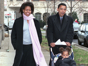 Then-Illinois state Sen. Barack Obama walks with his wife, Michelle, and daughter, Malia, age 1 1/2, in Chicago on primary day in March 2000. Obama lost to incumbent U.S. Rep. Bobby Rush in the primary.