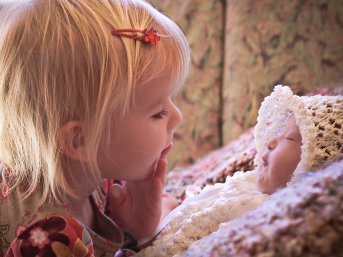 Kelle Hampton's daughter, Lainey, loved her little sister, Nella, before she even met her.