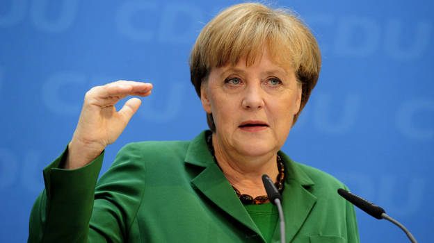 German Chancellor Angela Merkel, shown here at a press conference in Berlin on Monday, has led the call for austerity in Europe. But Sunday's elections in France and Greece point to a growing backlash on the Continent.