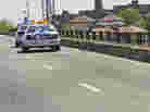 Skid marks left by a van are visible on a highway after a van plunged over both the concrete and iron railing, killing three generations of a Bronx family, in New York. Skid marks left by a van are visible on a highway after a van plunged over both the concrete and iron railing, killing three generations of a Bronx family, in New York.