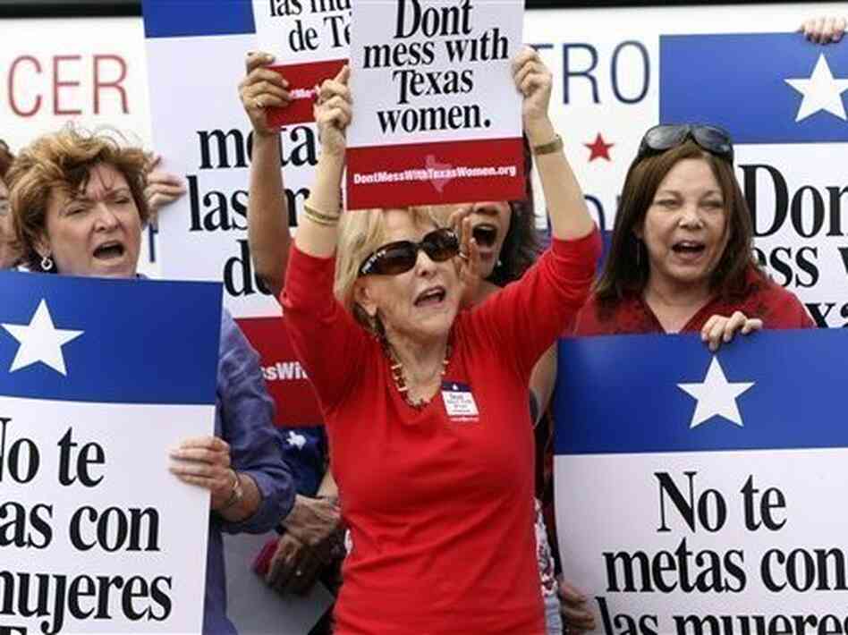 Protesters in San Antonio argue against efforts to cut Planned Parenthood from Texas' Women's Health Program in March. Protesters in San Antonio argue against efforts to cut Planned Parenthood from Texas' Women's Health Program in March.