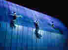 Rheinmaidens dangle from the $16 million set in the Met's production of Wagner's Ring cycle. Rheinmaidens dangle from the $16 million set in the Met's production of Wagner's Ring cycle.