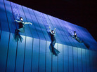 Rheinmaidens dangle from the $16 million set in the Met's production of Wagner's Ring cycle. Rheinmaidens dangle from the $16 million set in the Met's production of Wagner's Ring cycle.