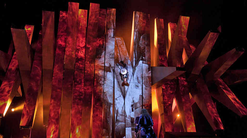 Brünnhilde (center) is surrounded by fire at the end of Wagner's Die Walküre — part of the Met's current Ring cycle, produced by Robert Lepage.