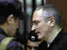 Former Yukos CEO Mikhail Khodorkovsky walks into court in Moscow, Russia, May 24, 2011. A Moscow appeals court upheld the second conviction of Khodorkovsky, reducing his prison sentence by one year for a total of 13 years. He will be released in 2016. Former Yukos CEO Mikhail Khodorkovsky walks into court in Moscow, Russia, May 24, 2011. A Moscow appeals court upheld the second conviction of Khodorkovsky, reducing his prison sentence by one year for a total of 13 years. He will be released in 2016.