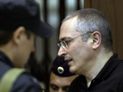 Former Yukos CEO Mikhail Khodorkovsky walks into court in Moscow, Russia, May 24, 2011. A Moscow appeals court upheld the second conviction of Khodorkovsky, reducing his prison sentence by one year for a total of 13 years. He will be released in 2016. Former Yukos CEO Mikhail Khodorkovsky walks into court in Moscow, Russia, May 24, 2011. A Moscow appeals court upheld the second conviction of Khodorkovsky, reducing his prison sentence by one year for a total of 13 years. He will be released in 2016.