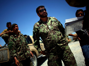 Afghan army Maj. Gen. Ahmed Habibi signs a logbook for diesel fuel he received from a U.S. Army tanker at a base in southern Afghanistan. Afghan army Maj. Gen. Ahmed Habibi signs a logbook for diesel fuel he received from a U.S. Army tanker at a base in southern Afghanistan.